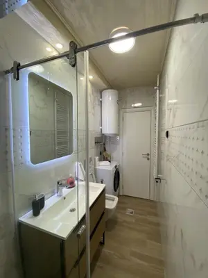 a bathroom with a sink and a toilet at Daca 2 in Belgrade
