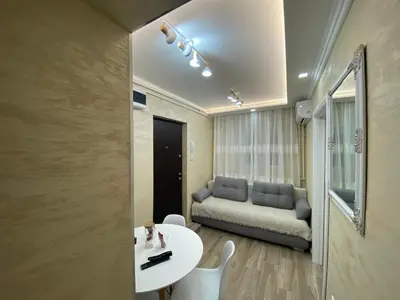 a living room with a table and a couch at Daca 2 in Belgrade