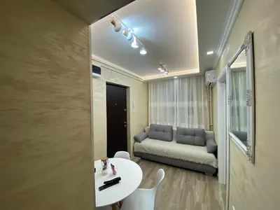 a living room with a table and a couch at Daca 2 in Belgrade