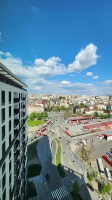 a view of a city with a building and a parking lot at Belgrade Waterfront 16th fl Lux Apt. w/ City view in Belgrade