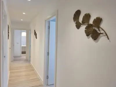 a heart shaped wall decoration in a hallway at BW Aria deluxe apartments in Belgrade