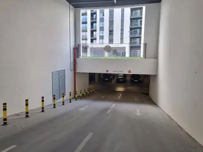 an empty hallway with a balcony in a building at BW Aria deluxe apartments in Belgrade
