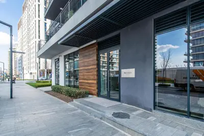 a facade of a building with large glass windows at Modern Luxury in Belgrade Waterfront with Views in Belgrade