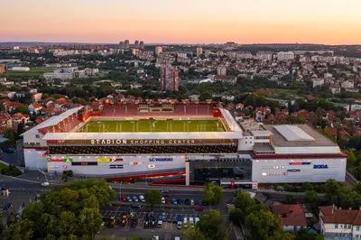 an aerial view of a stadium with a soccer field at AT Mirror in Voždovac