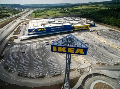 an aerial view of a kera building with a train station at AT Mirror in Voždovac