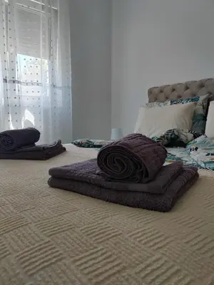 a bedroom with two large pillows on the floor at La Vista in Stari Banovci