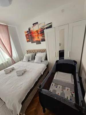 a bedroom with a large bed in a room at Elegant escape in Bele Vode