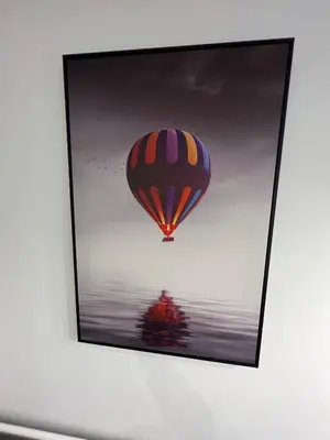 a picture of a hot air balloon over water at Apartment 55 Belgrade in Belgrade