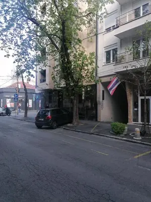 a car parked on a street next to a building at Belgrade apartment Skadarlija II in Belgrade