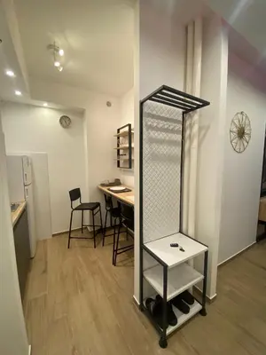 a dressing room with a table and a mirror at Sancho Leone in Belgrade