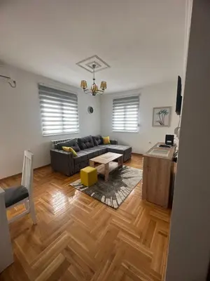 a living room with a couch and a table at Port 2 in Belgrade