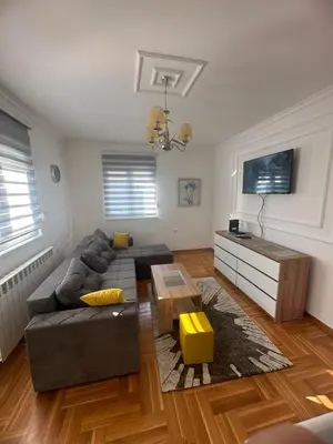 a living room with a couch and a table at Port 2 in Belgrade
