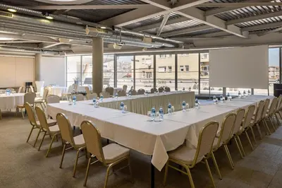 a large conference room with a long table and chairs at Nobel Zira Hotel in Belgrade