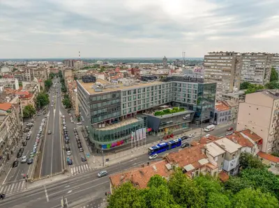 an aerial view of a city with traffic and buildings at Nobel Zira Hotel in Belgrade