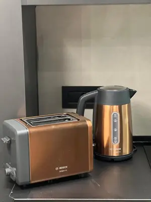 a toaster and a toaster oven sitting on a counter at Moderna Vračar in Belgrade