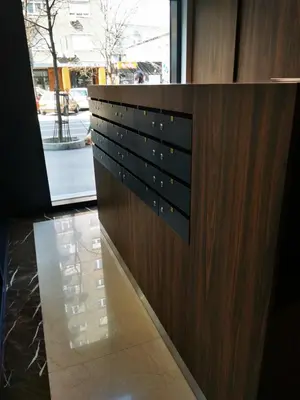 a wooden wall with a door in a building at Natalie's Condo in Belgrade