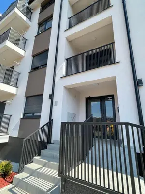 an apartment building with stairs and a door at Cvetanov trg LUX 1 in Belgrade