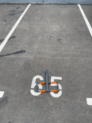 a parking lot with a letter b on it at Cvetanov trg LUX 1 in Belgrade