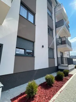 an apartment building with balconies and plants at Cvetanov trg LUX 1 in Belgrade