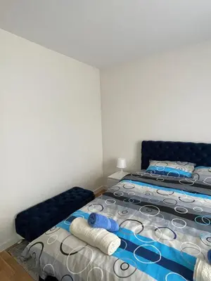 a bedroom with two beds in a room at Cvetanov trg LUX 1 in Belgrade