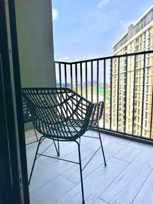 a bench sitting on the balcony of a building at Apartman Grand BW in Belgrade