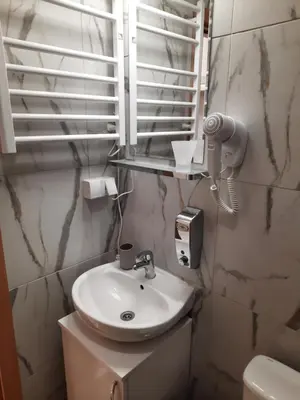 a bathroom with a sink and a mirror at Aleksa 1 in Belgrade