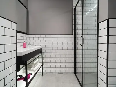 a bathroom with a sink and a shower at Moxy Belgrade in Belgrade