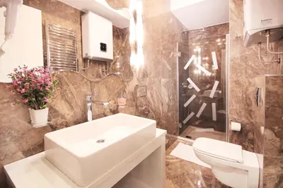 a bathroom with a sink and a toilet at Apartments Belgrade in Belgrade