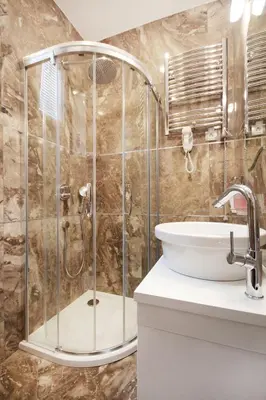 a bathroom with a shower and a sink at Apartments Belgrade in Belgrade