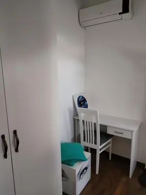 a room with a desk and a chair and a desk at MatIne Belgrade Zvezdara in Vračar (historical)