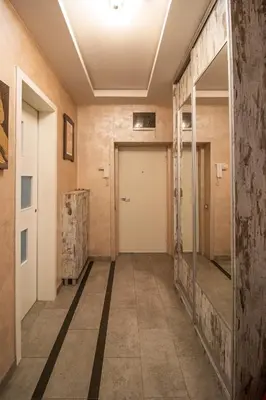 an empty hallway with a door in a building at City Center Apartment in Belgrade