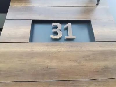 a digital clock with the number on it at Hill Dreams Lux in Belgrade