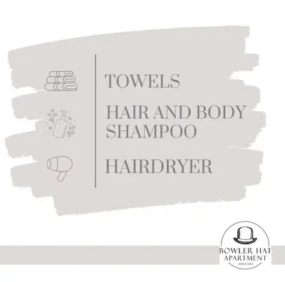 a sign that reads towels hair and body shampoo and harpervelt at Bowler Hat Apartment Belgrade in Zvezdara