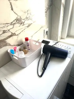 a pen sitting on top of a counter in a bathroom at skadarlija bohemian in Belgrade