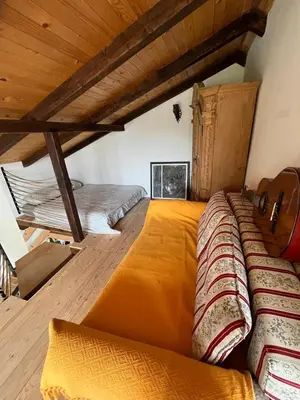 a bedroom with two beds in a room at Vikendica Smokvica in Sremski Karlovci