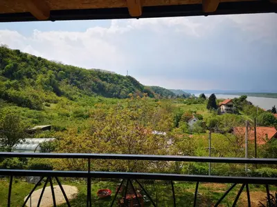 a view from a balcony of a hill with a house at Apartman Snežana Jugovo in Smederevo